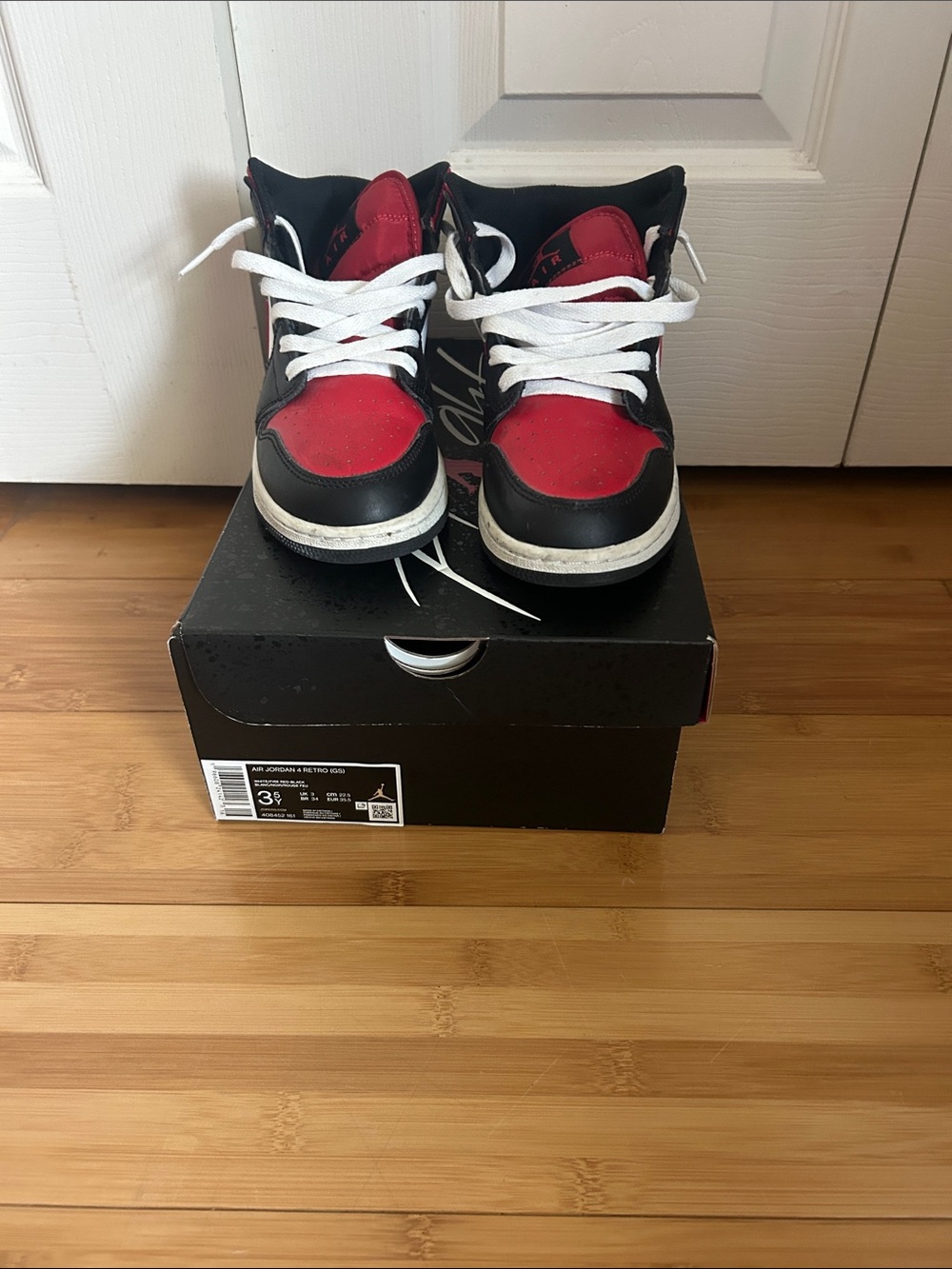 Jordan Kids High-Top Sneakers in Black, Red and White